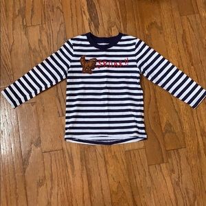 Striped navy blue “Roar” shirt